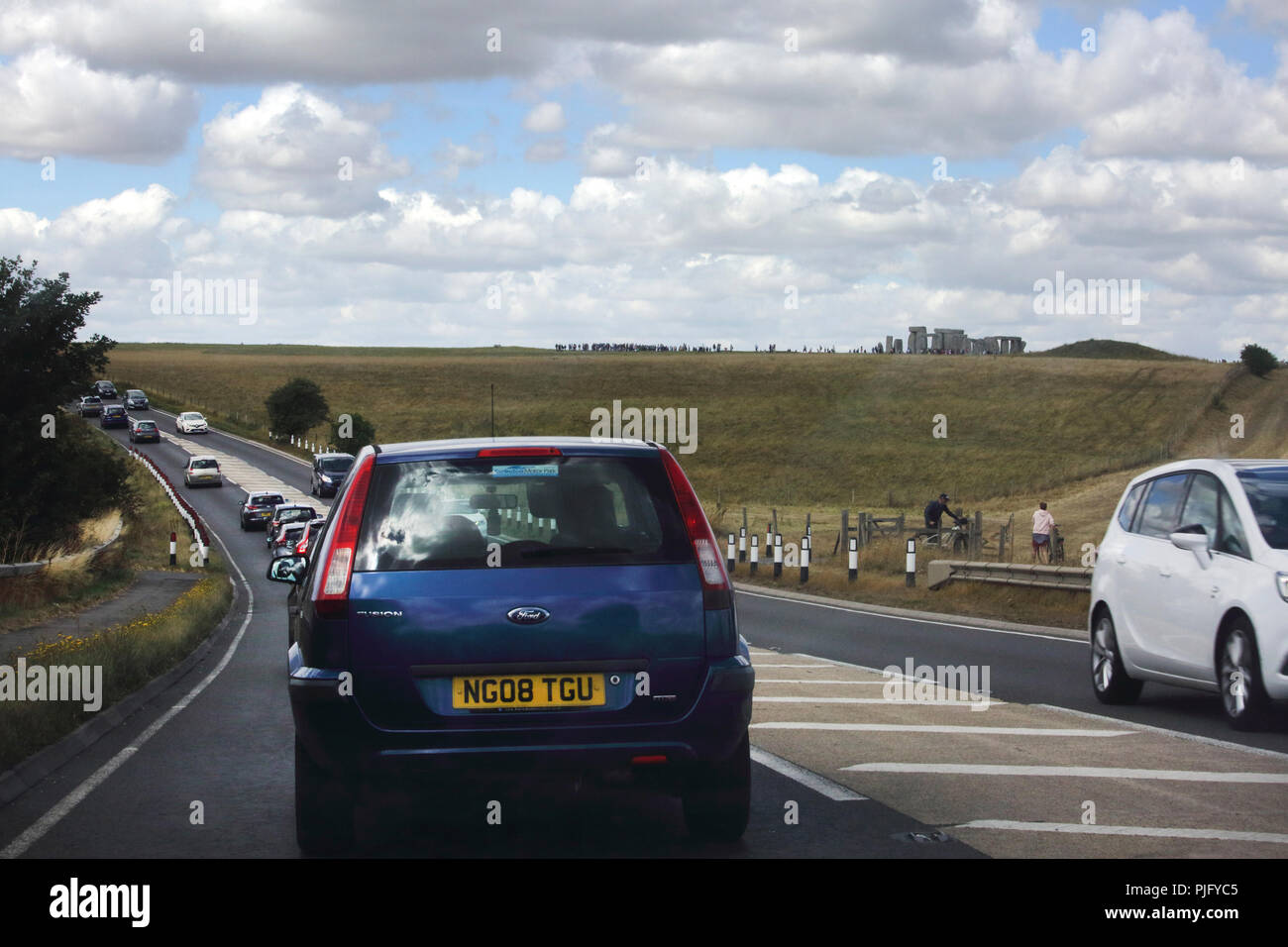 Salisbury Wiltshire England A303 Cars driving past Stonehenge Stock