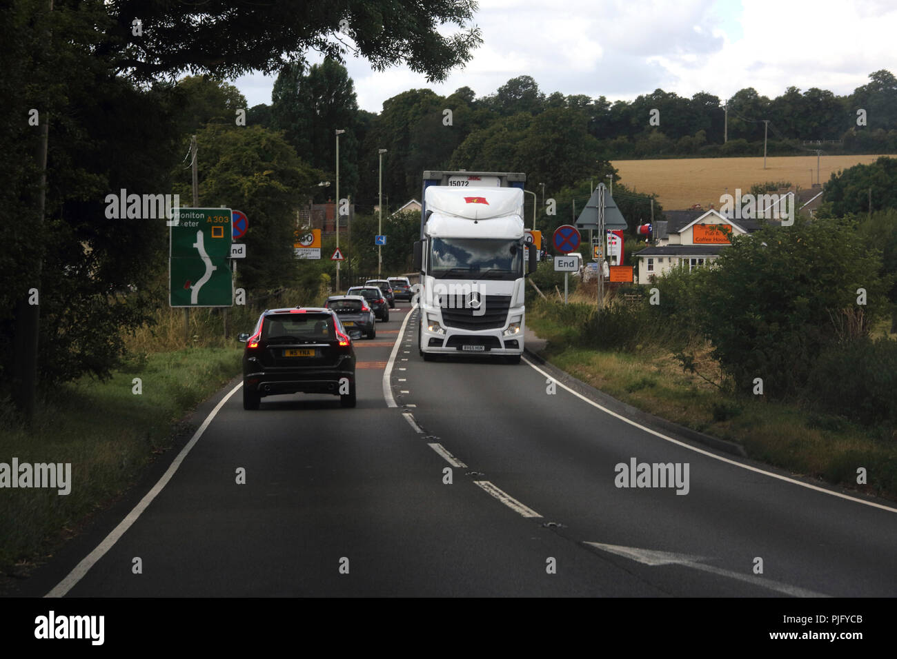 Winterbourne Stoke Wiltshire England Heavy Traffic on A303 going through Village Stock Photo