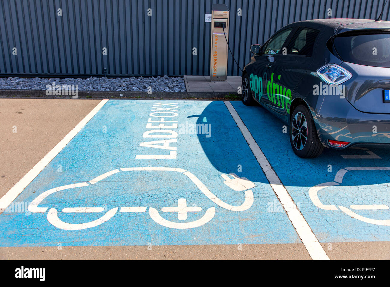 Charging station, extra parking for electric vehicles in the customer parking lot of Stadtwerke Lemgo, city electric company, Germany Stock Photo