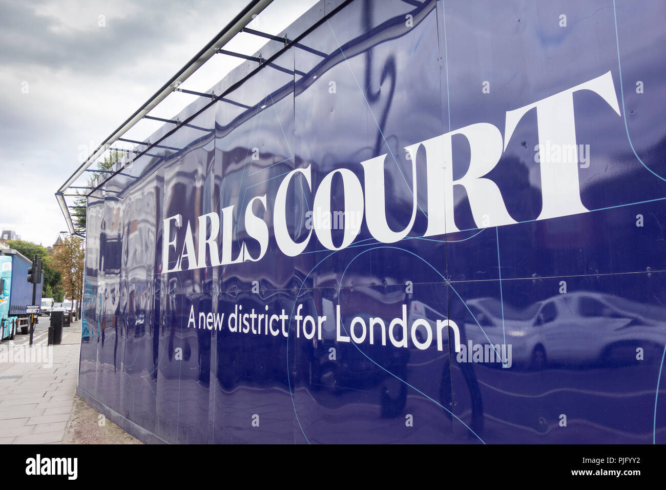 Builder's hoardings outside the Earls Court development site on Warwick Avenue, London, UK Stock Photo