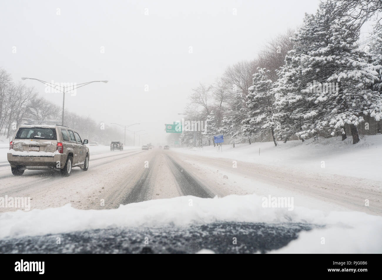 Driving in the snow on NY 490 in Downtown Rochester, New York USA Stock ...