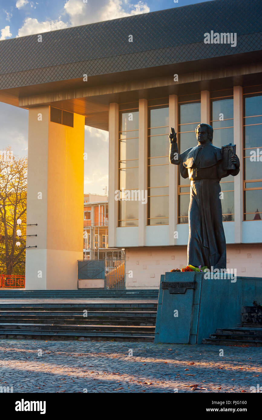 A. Dukhnovich memorial near the Uzhgorod Drama Theater. lovely urban scenery at sunrise in autumn Stock Photo