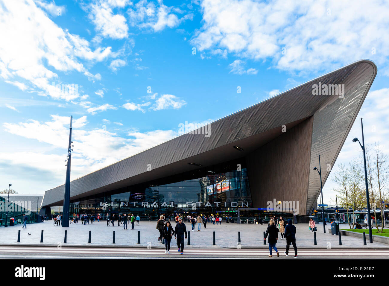 ROTTERDAM, Netherlands - April 15 2017: Rotterdam Centraal Rail Station modern architecture landscape view with commuters Stock Photo