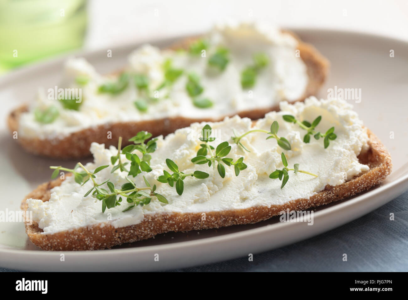 Sandwiches with soft cheese and thyme Stock Photo