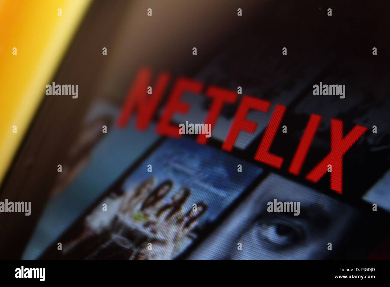 Netflix logo on screen Stock Photo