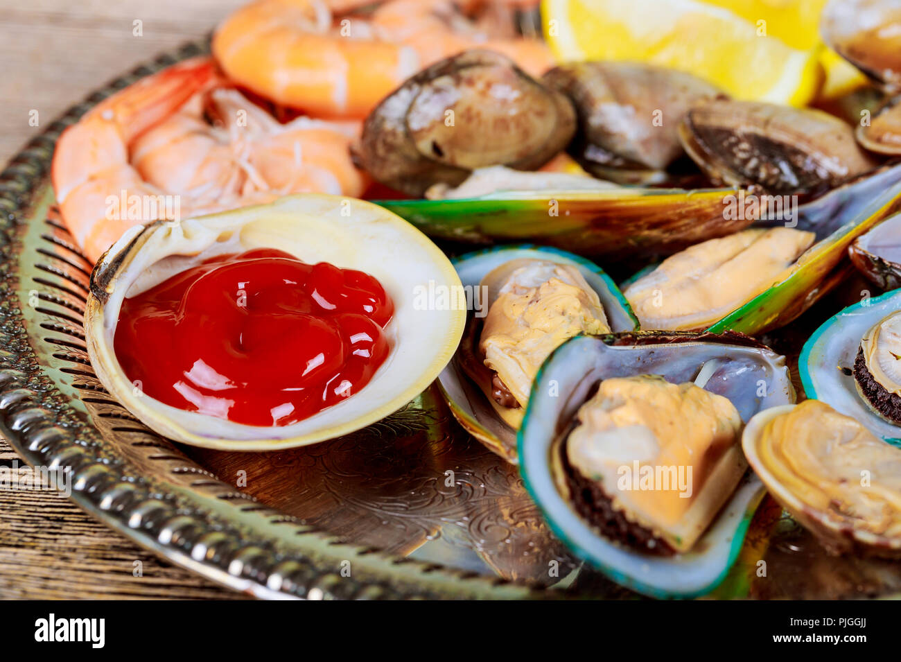 Seafood ready to eat. Seafood selection of cooked mussels and shrimp