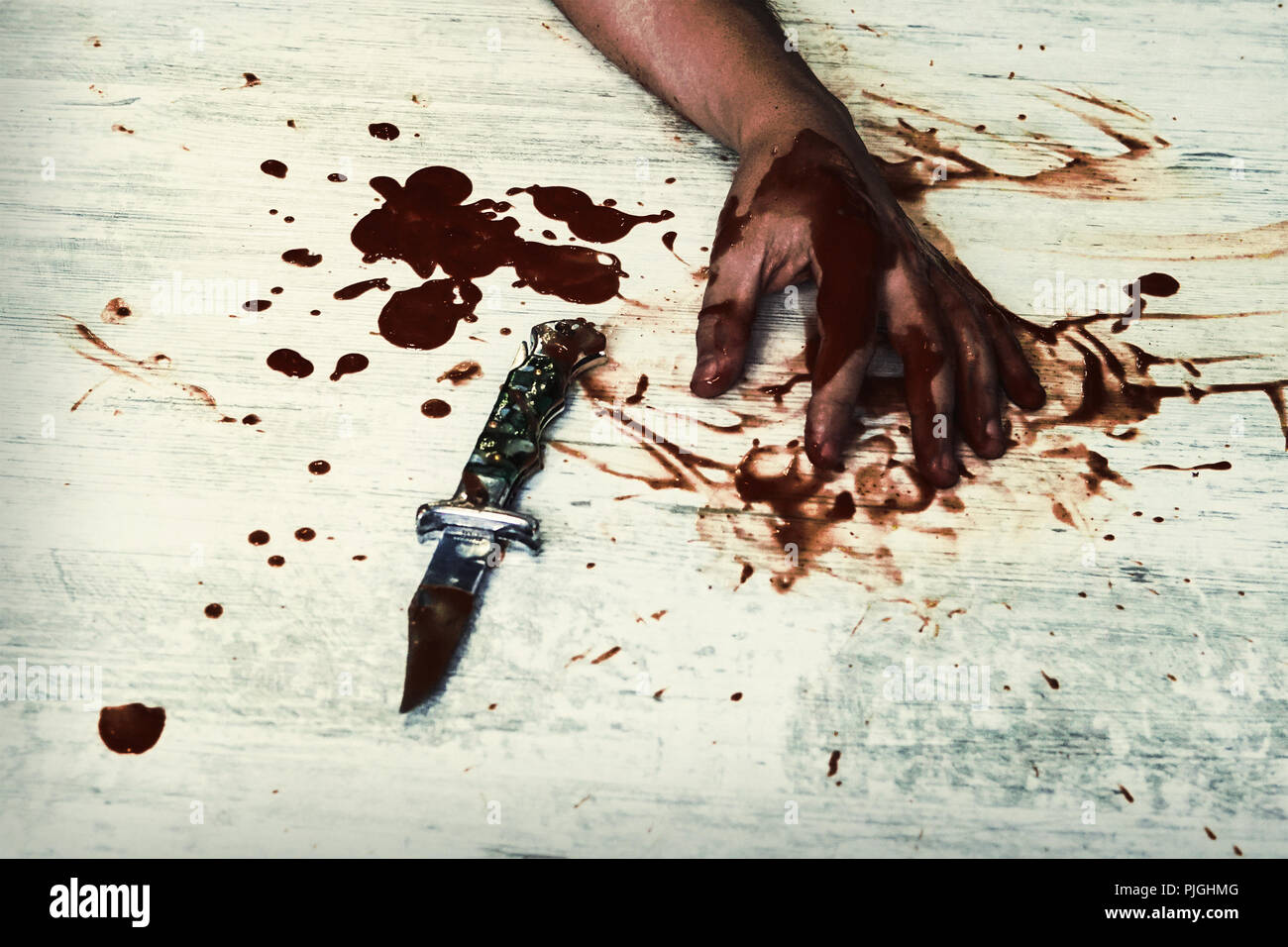 conceptual image of a victim hand holding a sharp knife with blood on it resting on a white vintage floor concept photo of murder and crime stock photo alamy https www alamy com conceptual image of a victim hand holding a sharp knife with blood on it resting on a white vintage floor concept photo of murder and crime image217953360 html