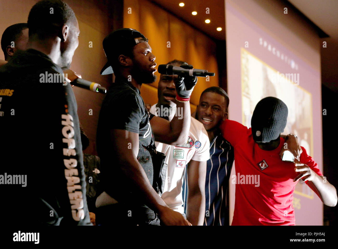 Drill rappers turned gospel artists 'Hope Dealers' perform on stage at a SPAC Nation event held at the Riverbank Park Plaza, London. Stock Photo