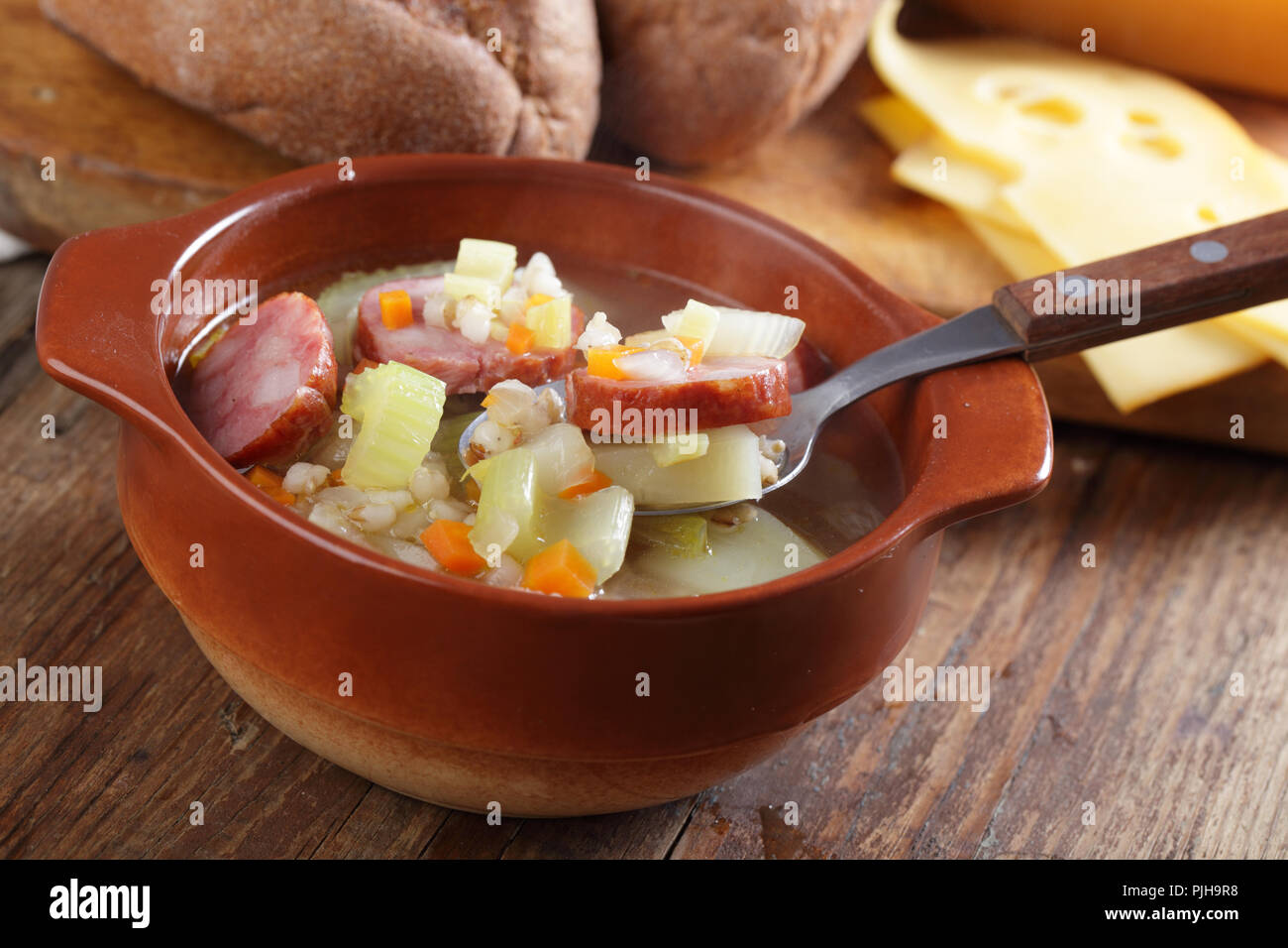 Bundner barley soup with sausage and vegetables Stock Photo Alamy
