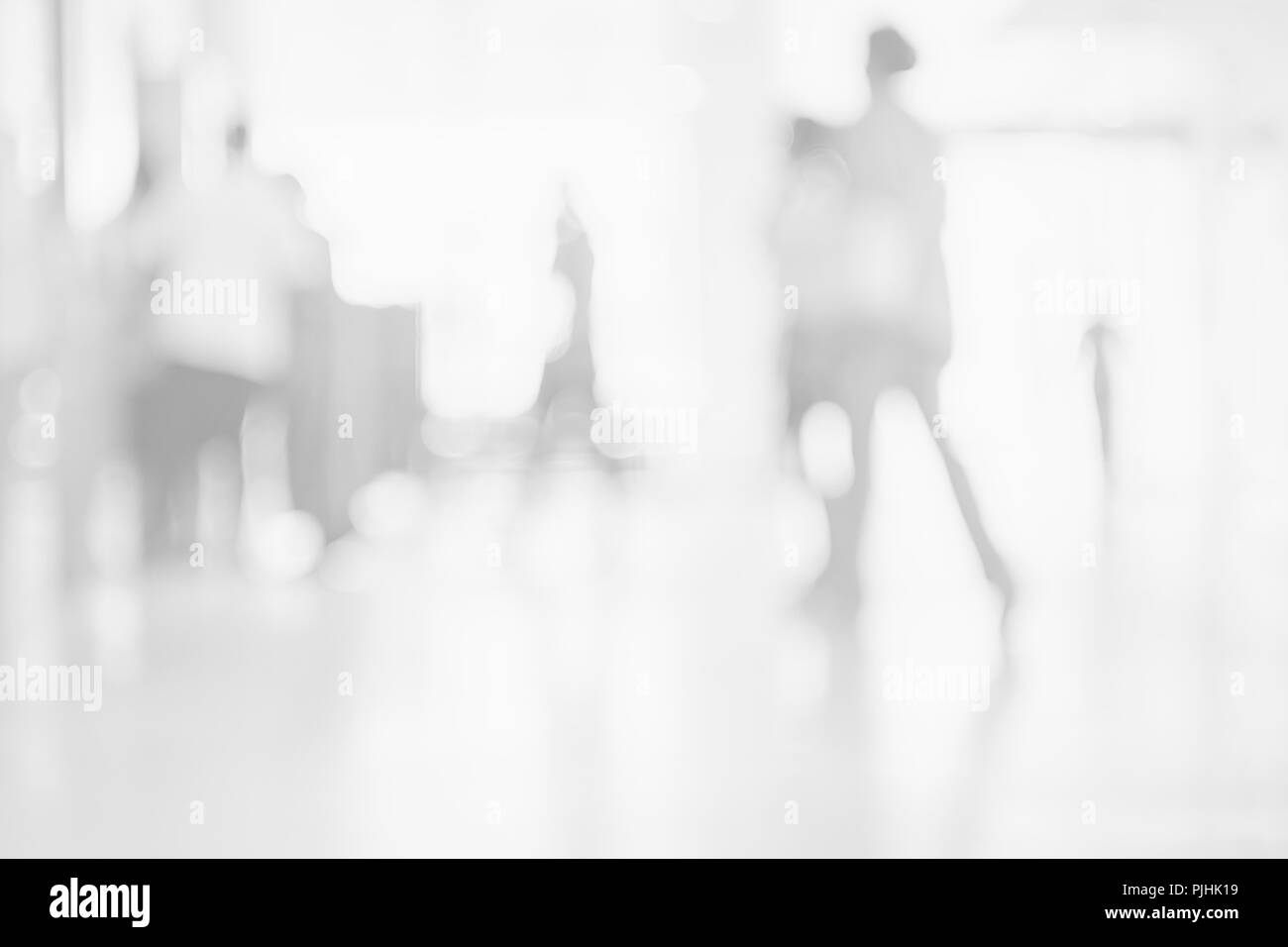 Blurred people walk on pathway Abstract white grey background for backdrop design, composition for , website, magazine or graphic for commercial campaign design Stock Photo