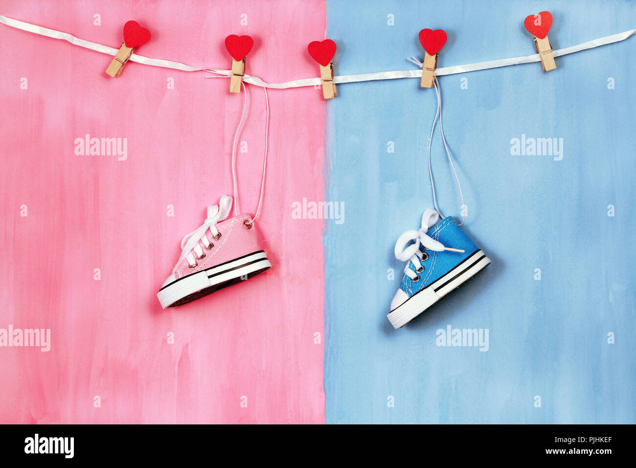 Baby Sneakers On Pink And Blue Background Baby Shower Concept