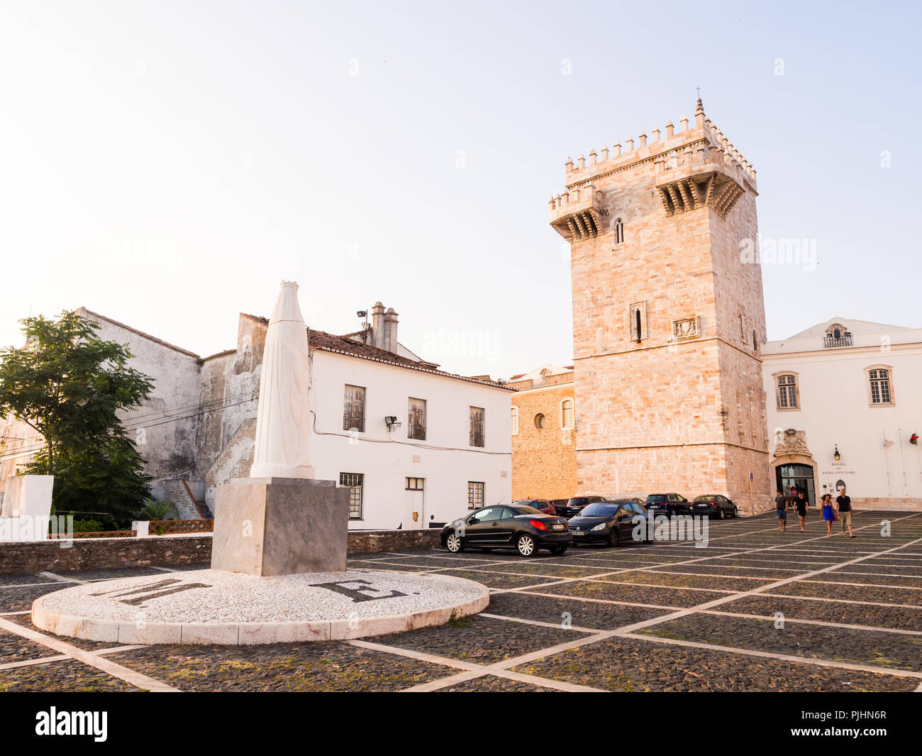ESTREMOZ, PORTUGAL – AUGUST 23, 2018: Estremoz Castle (Castelo da Rainha Santa Isabel) with Tres Coroas (Three Crowns) marble tower and Santa Isabel m Stock Photo