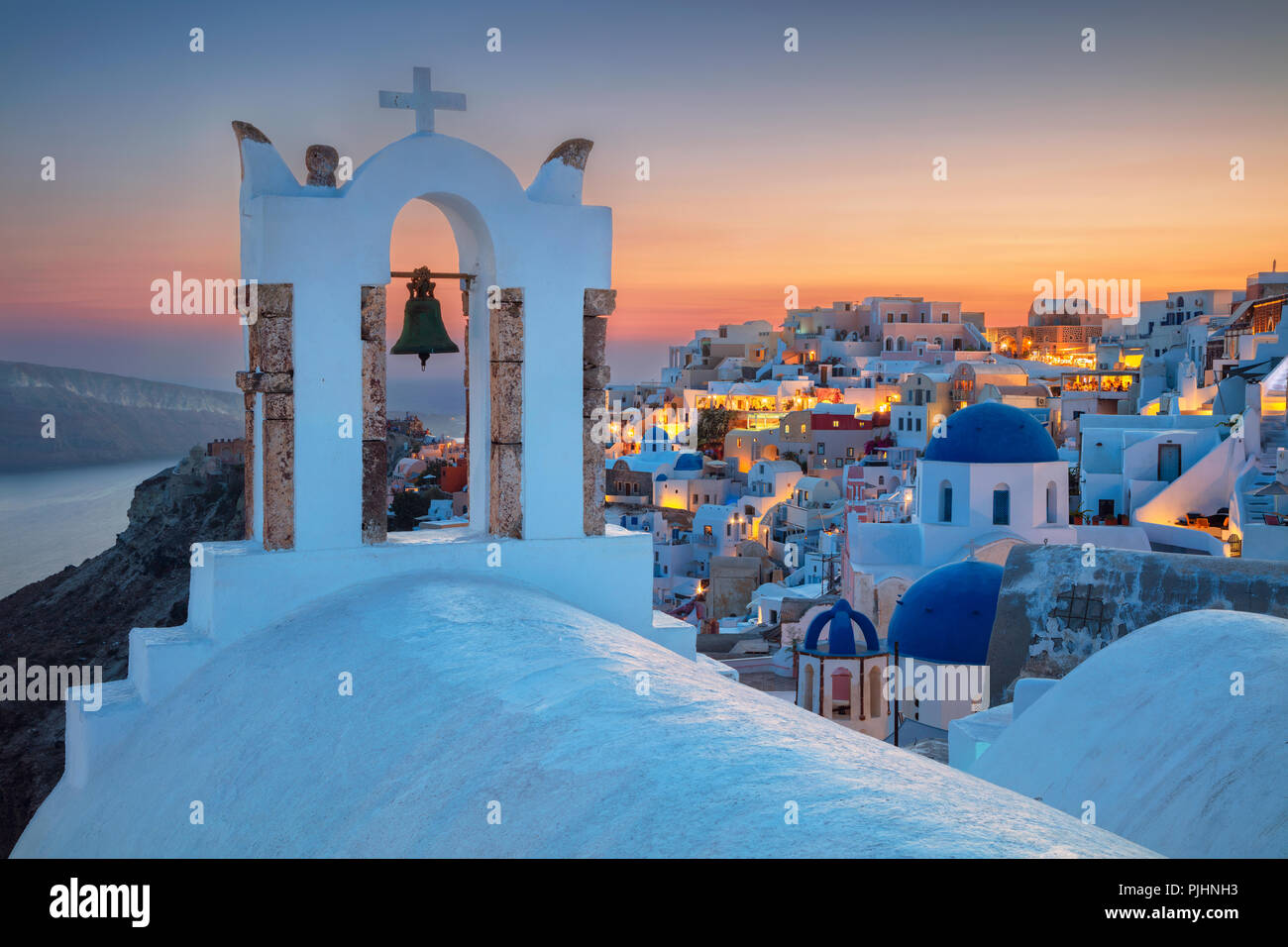 Oia, Santorini. Image of famous cyclades village Oia located at the island of Santorini, South Aegean, Greece. Stock Photo