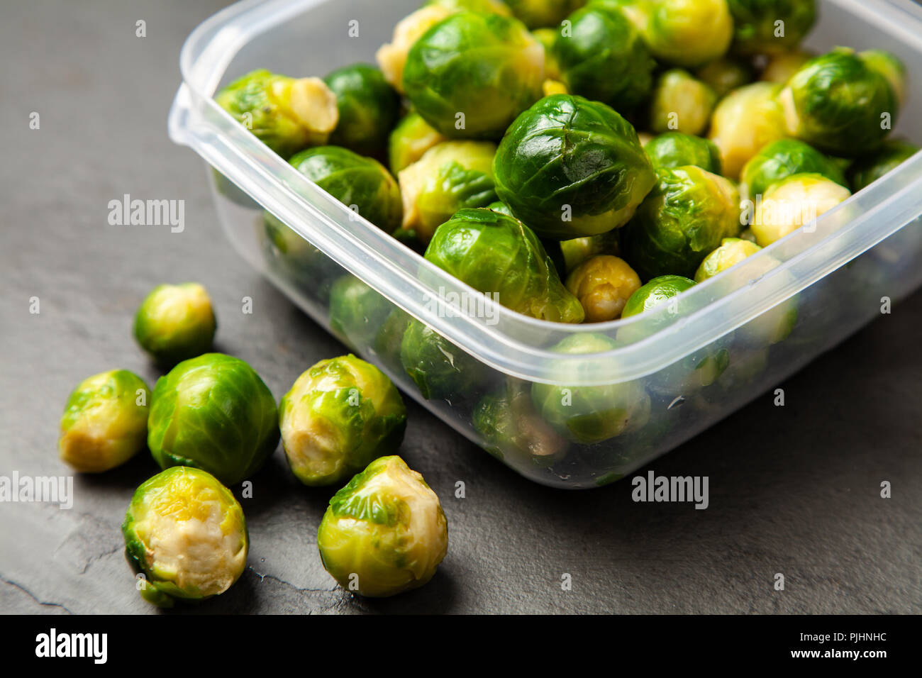 Brussles sprouts in a plastic container Stock Photo