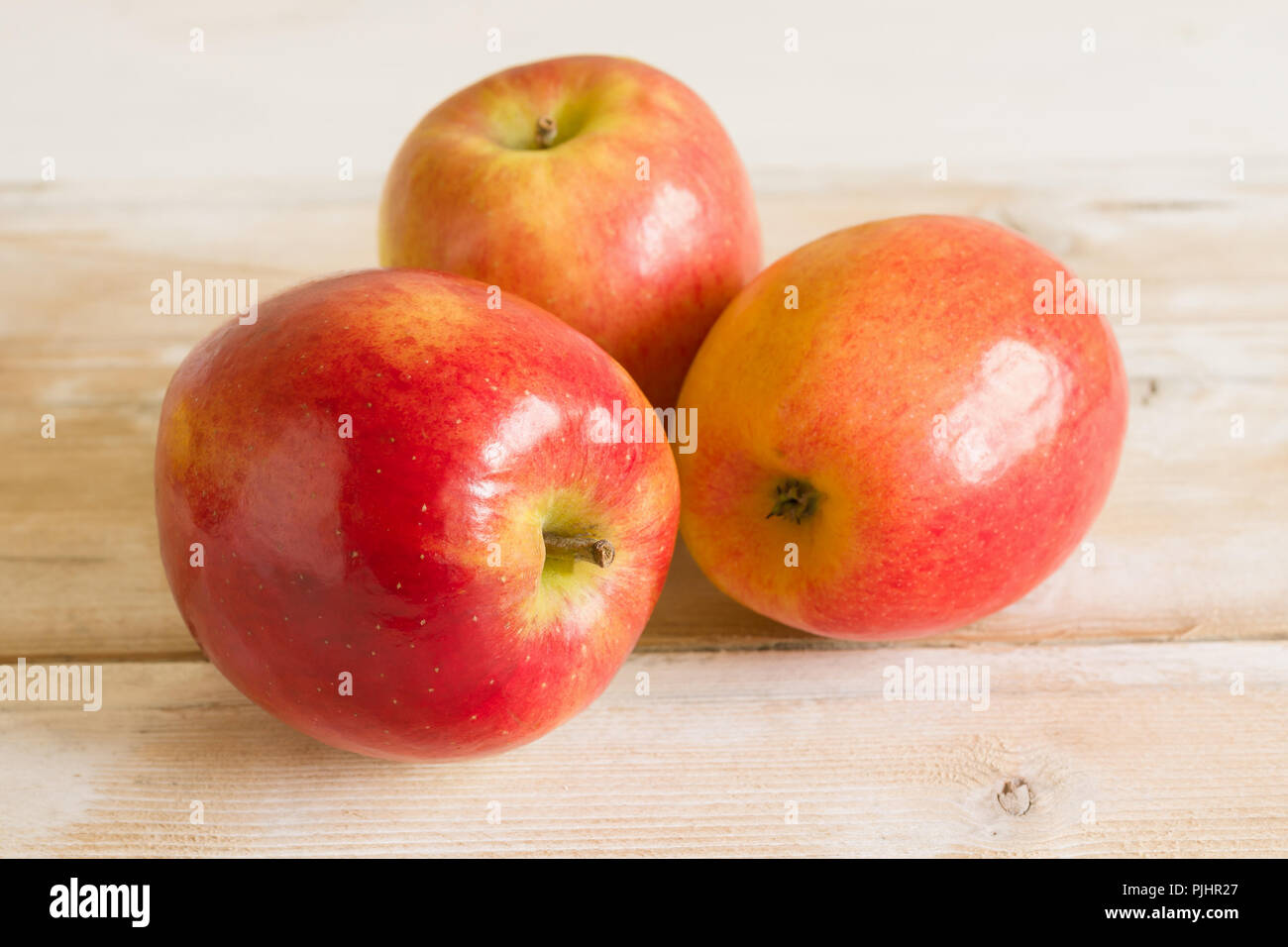 Jazz Apples or cultivar Malus domestica Scifresh a hybrid of Royal Gala and Braeburn developed in New Zealand Stock Photo