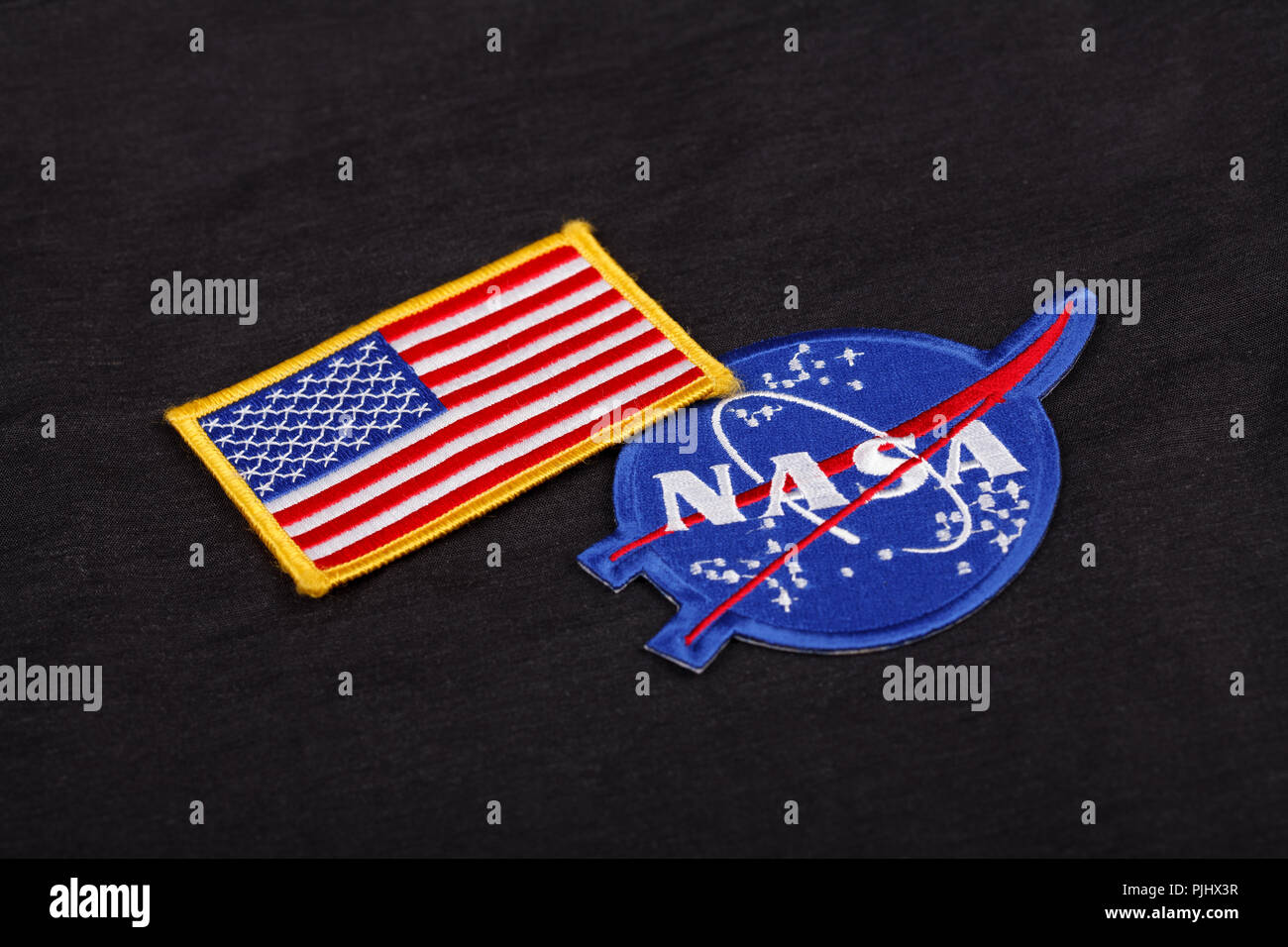15 March 2018 - The National Aeronautics and Space Administration (NASA)  emblem patch and US Flag patch on black uniform background Stock Photo -  Alamy
