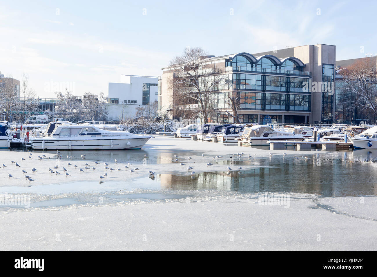 Boats on Brayford Pool Marina Lincoln,lincolnshire on a frozen winters day Stock Photo
