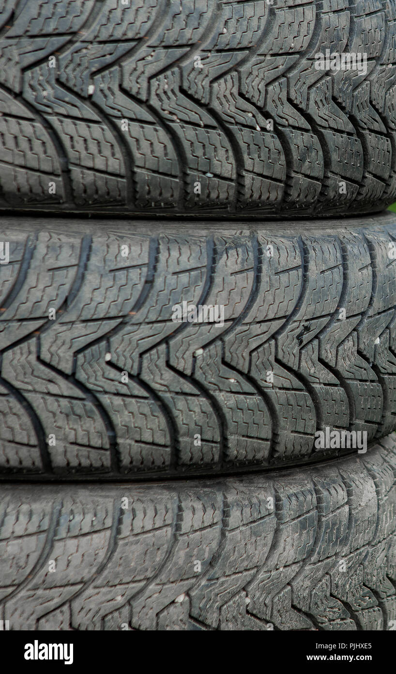 Winter tires close-up . Tyre background. Tire stack background Stock ...