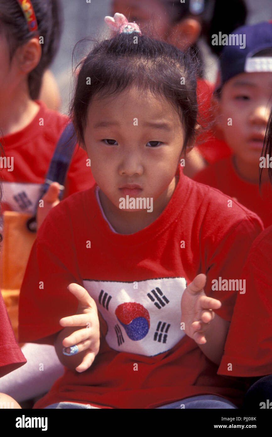 children at a monument of the Korean War Memorial in the city of Seoul ...