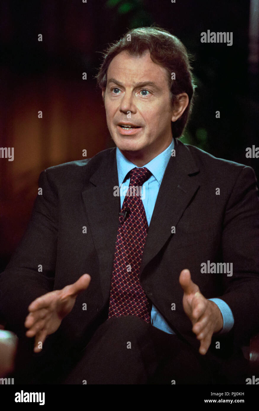 British Prime Minister Tony Blair discusses the ongoing conflict in