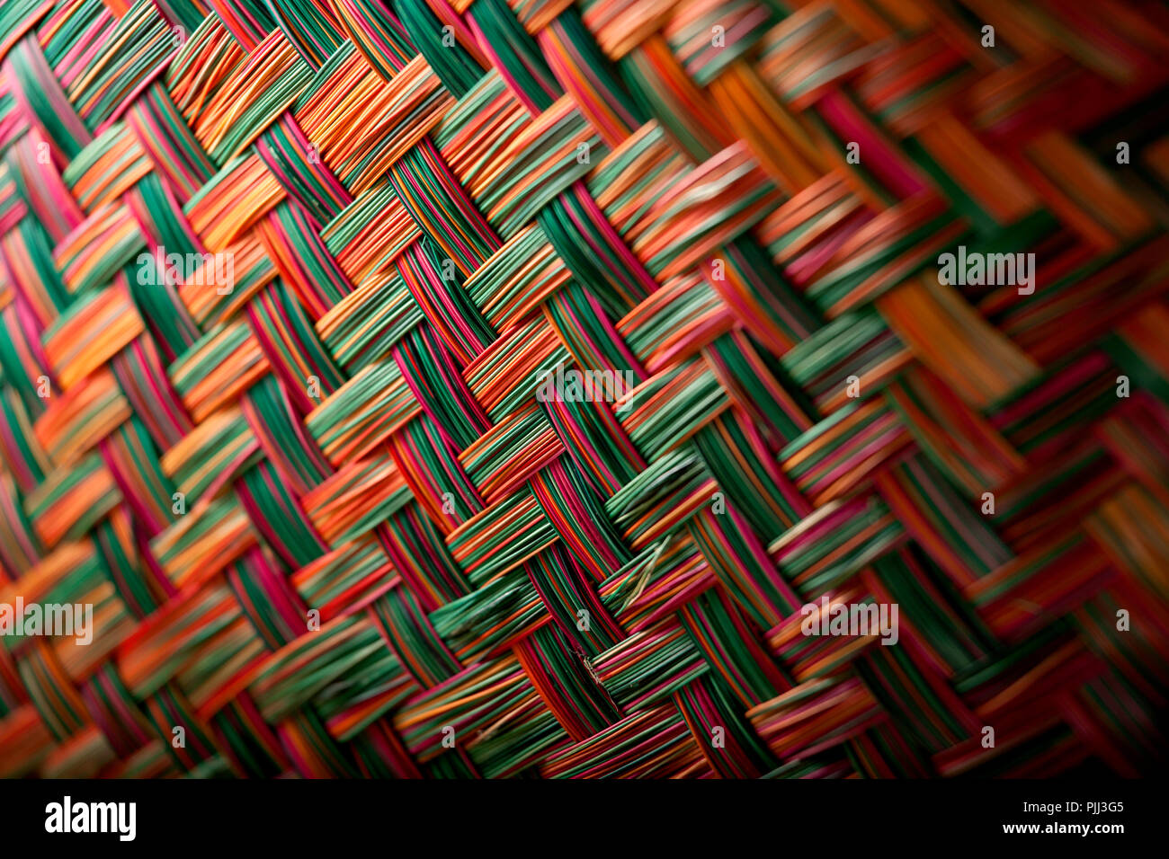 bright and colourful herring bone basket weave pattern Stock Photo