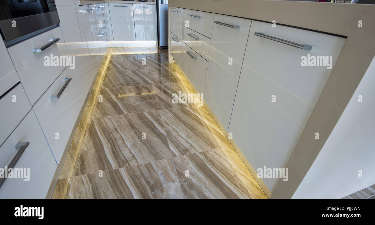 Interior design decor showing modern kitchen with led lighting in luxury apartment showroom Stock Photo