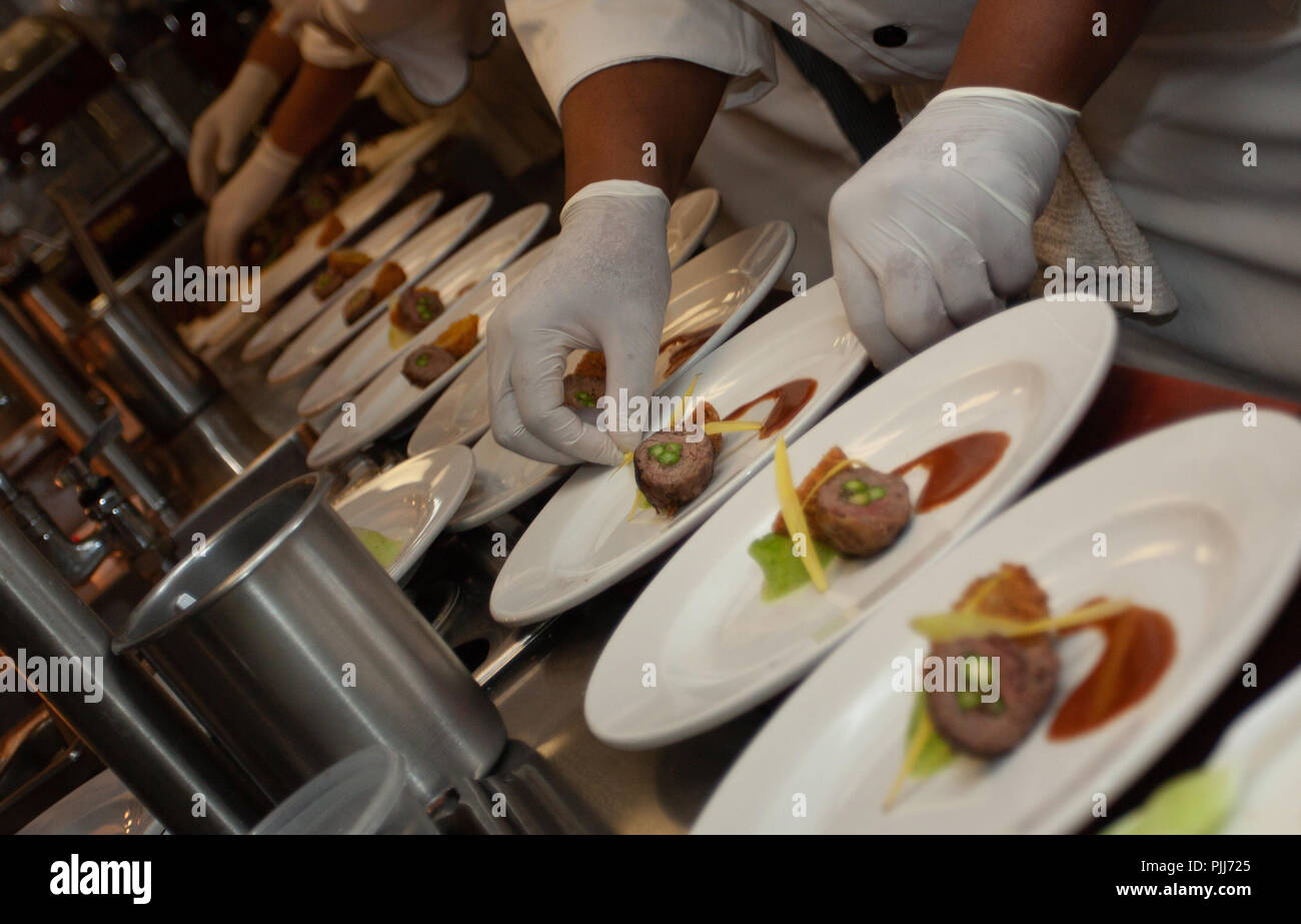 Mass production of plates for an event Stock Photo Alamy