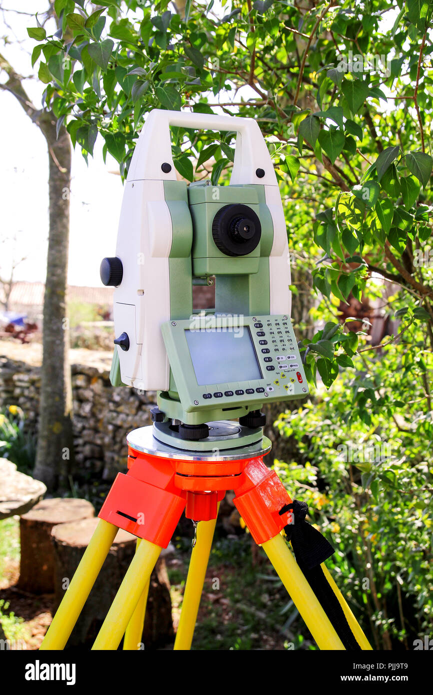 Total station. Survey Instrument geodetic device, total station set in the field Stock Photo Alamy