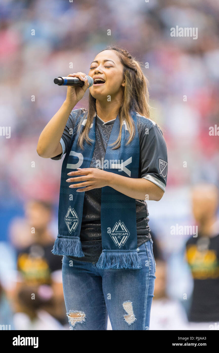 Female national anthem singer Stock Photo - Alamy