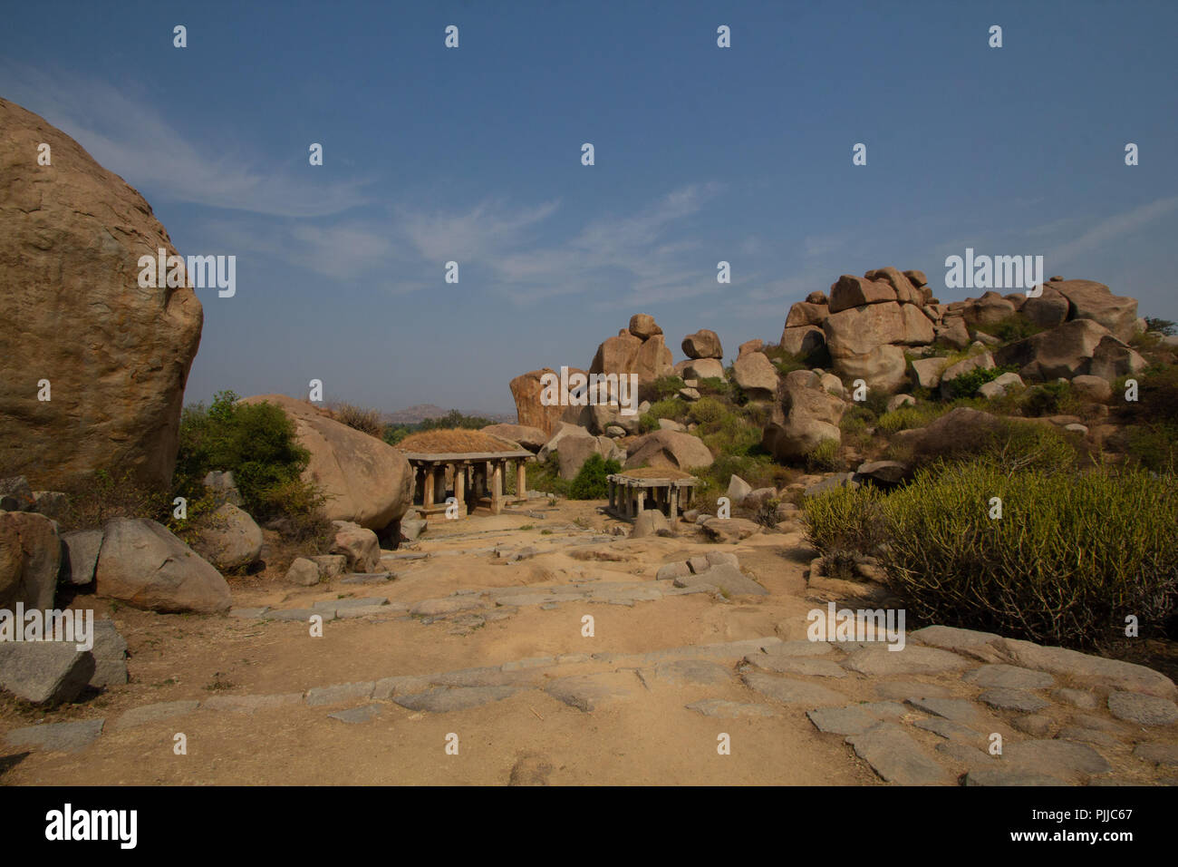 The Hampi’s boulder strewn landscape is one of the oldest exposed surfaces on earth Stock Photo