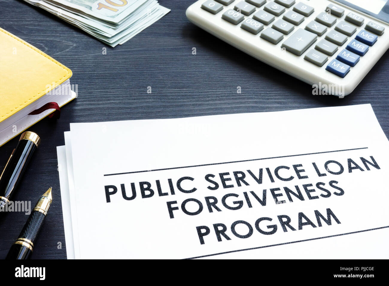 Public Service Loan Forgiveness PSLF Program documents. Stock Photo