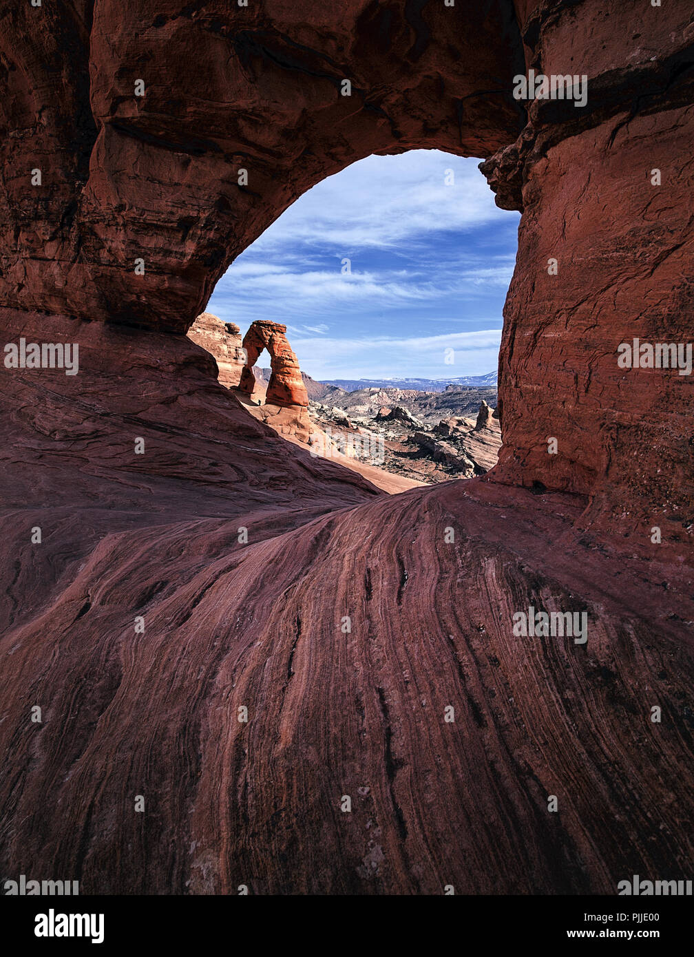 View of Delicate Arch Moab through Rock formation Stock Photo