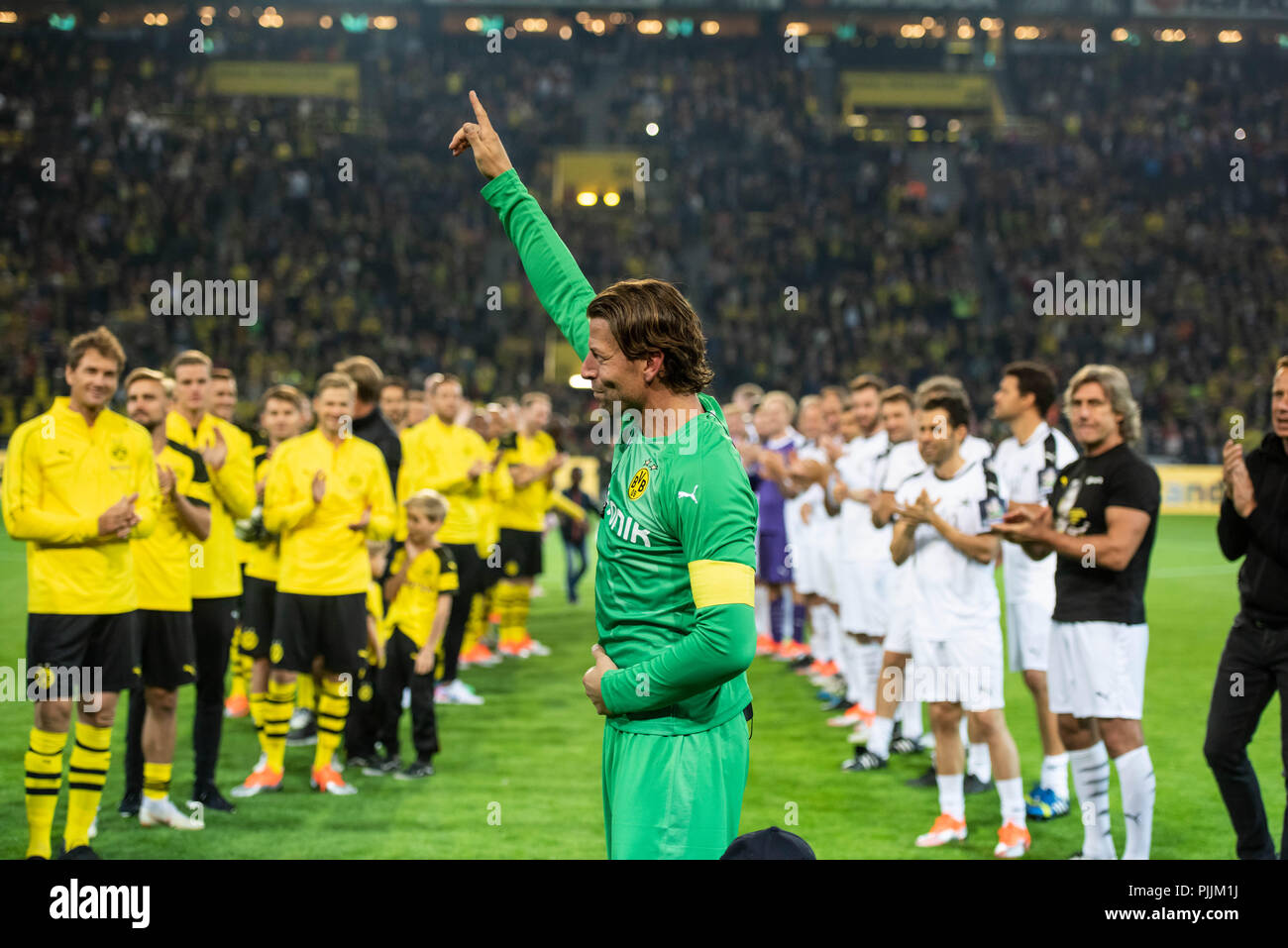 Dortmund, Germany. 07th Sep, 2018. Roman Weidenfeller's farewell match: Goalkeeper Roman Weidenfeller stands in the guard of his fellow players and opponents after the game. Credit: Bernd Thissen/dpa/Alamy Live News Stock Photo