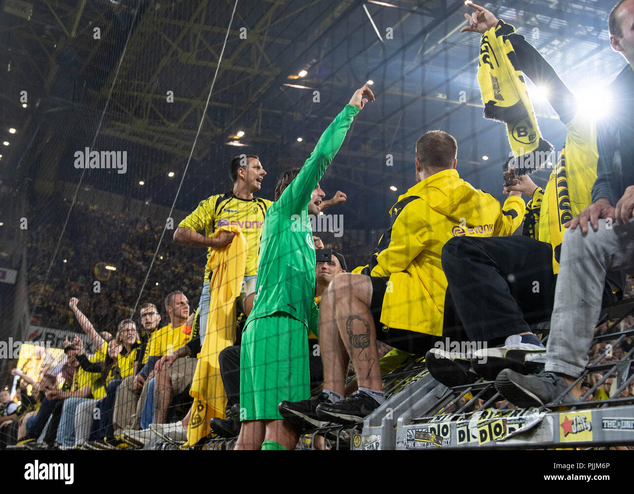 Dortmund, Germany. 07th Sep, 2018. Roman Weidenfeller's farewell match: Goalkeeper Roman Weidenfeller celebrates with fans in the south stand after the match. Credit: Bernd Thissen/dpa/Alamy Live News Stock Photo