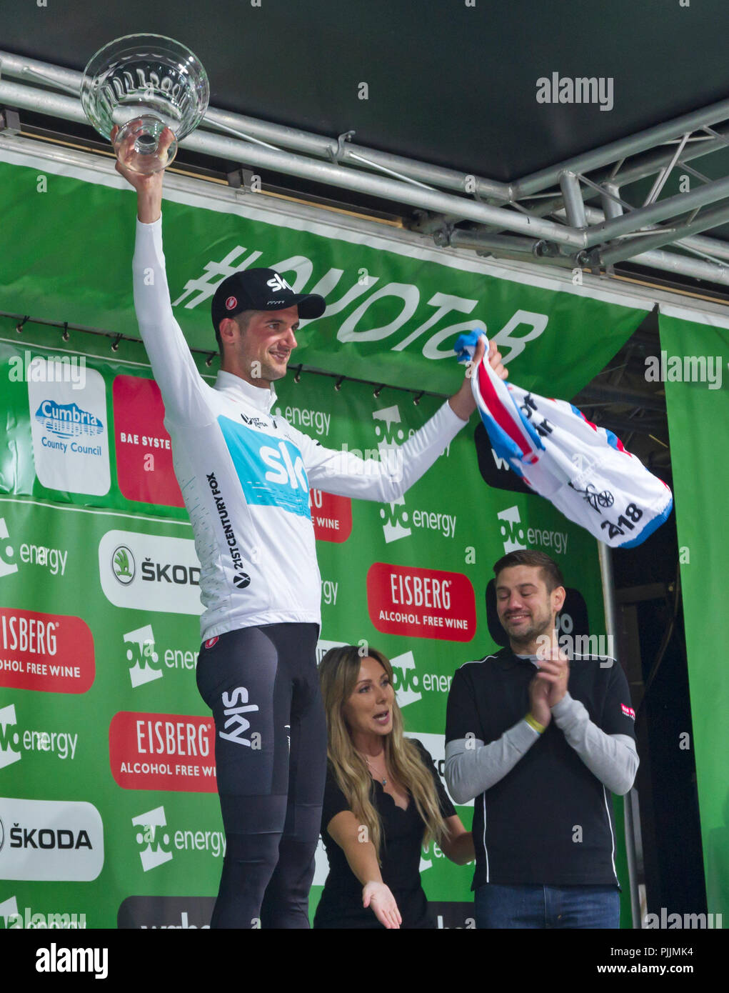 Whinlatter, Cumbria, UK. 7th September 2018. Stage  6, Tour of Britain, 7 September 2018. The winner of the stage, which finished at Whinlatter Visitor Centre after the second of two gruelling ascents of Whinlatter Pass, was Wout Poels of Team Sky, seen here on the Podium receiving his award and winner's jersey. Credit: Julie Fryer/Alamy Live News Stock Photo