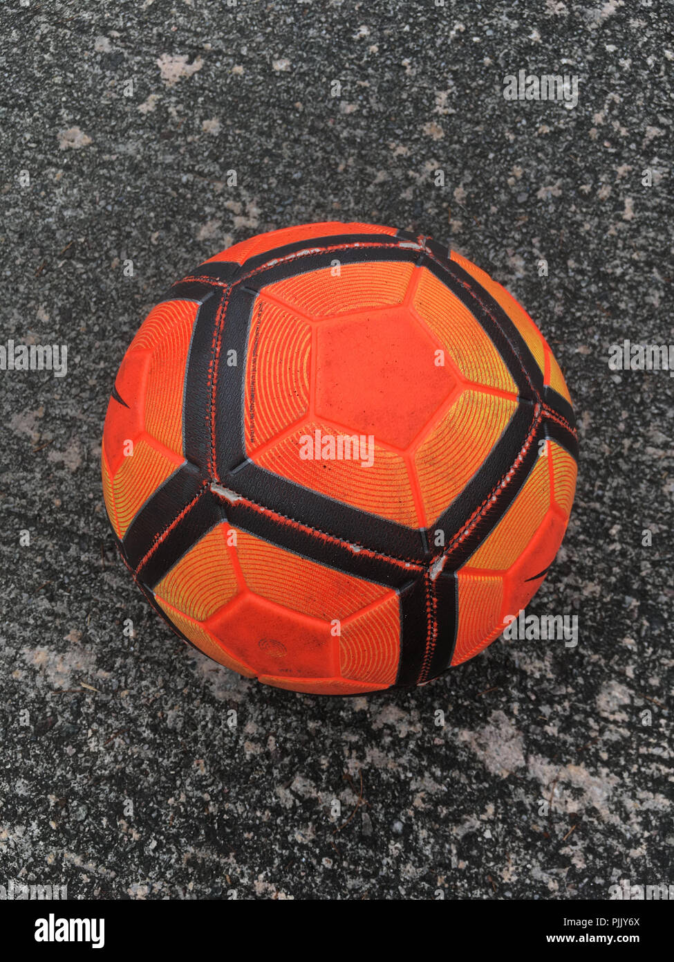 Orange colour football ball Stock Photo