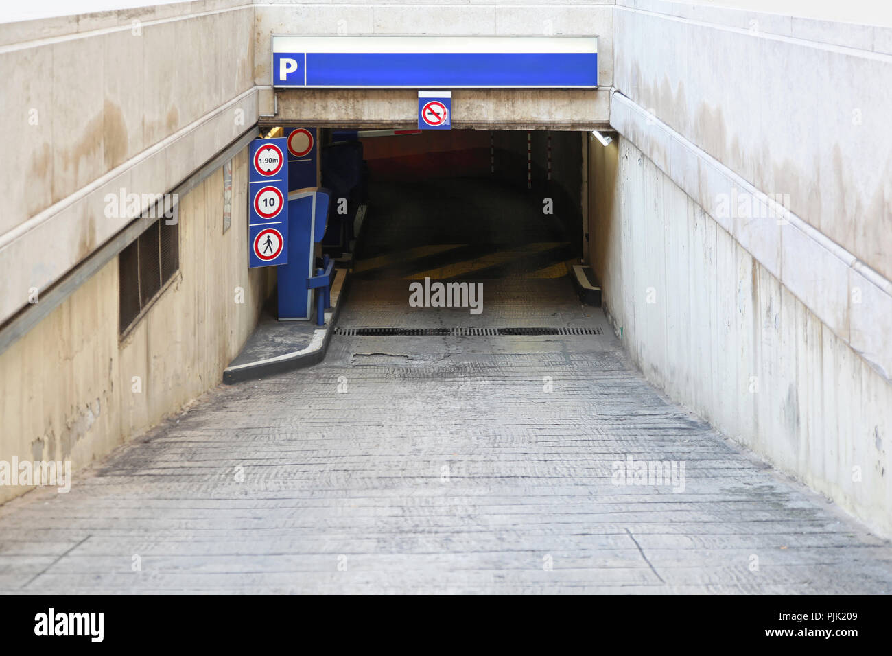 Ramp access  to underground public parking garage Stock Photo