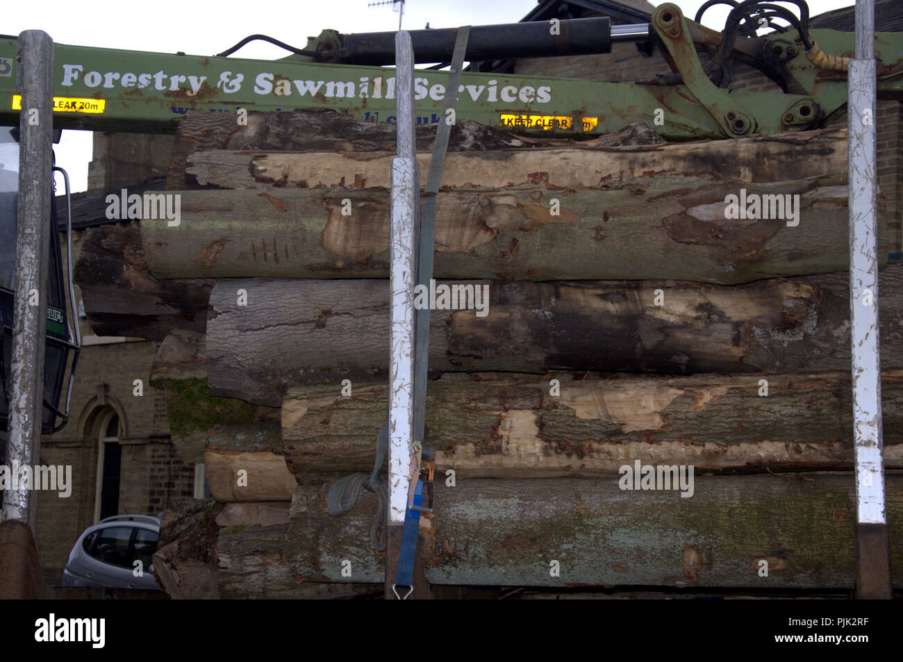 Truck carrying sawn logs of lumber in Saltaire, Yorkshire, uk Stock Photo