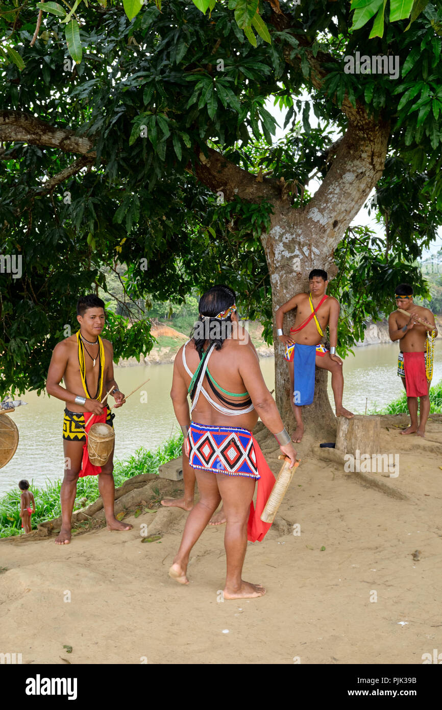 Chagres National Park, Panama - April 22, 2018: Embera native people playing authentic music Stock Photo