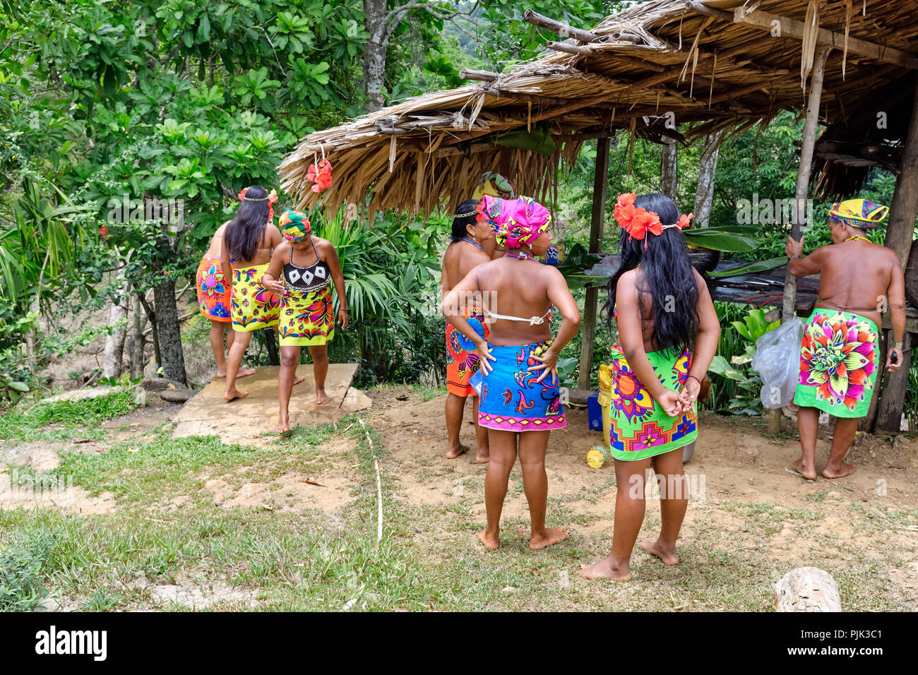 Chagres National Park, Panama - April 22, 2018: Native Embera women preparing food to visiting tourists Stock Photo