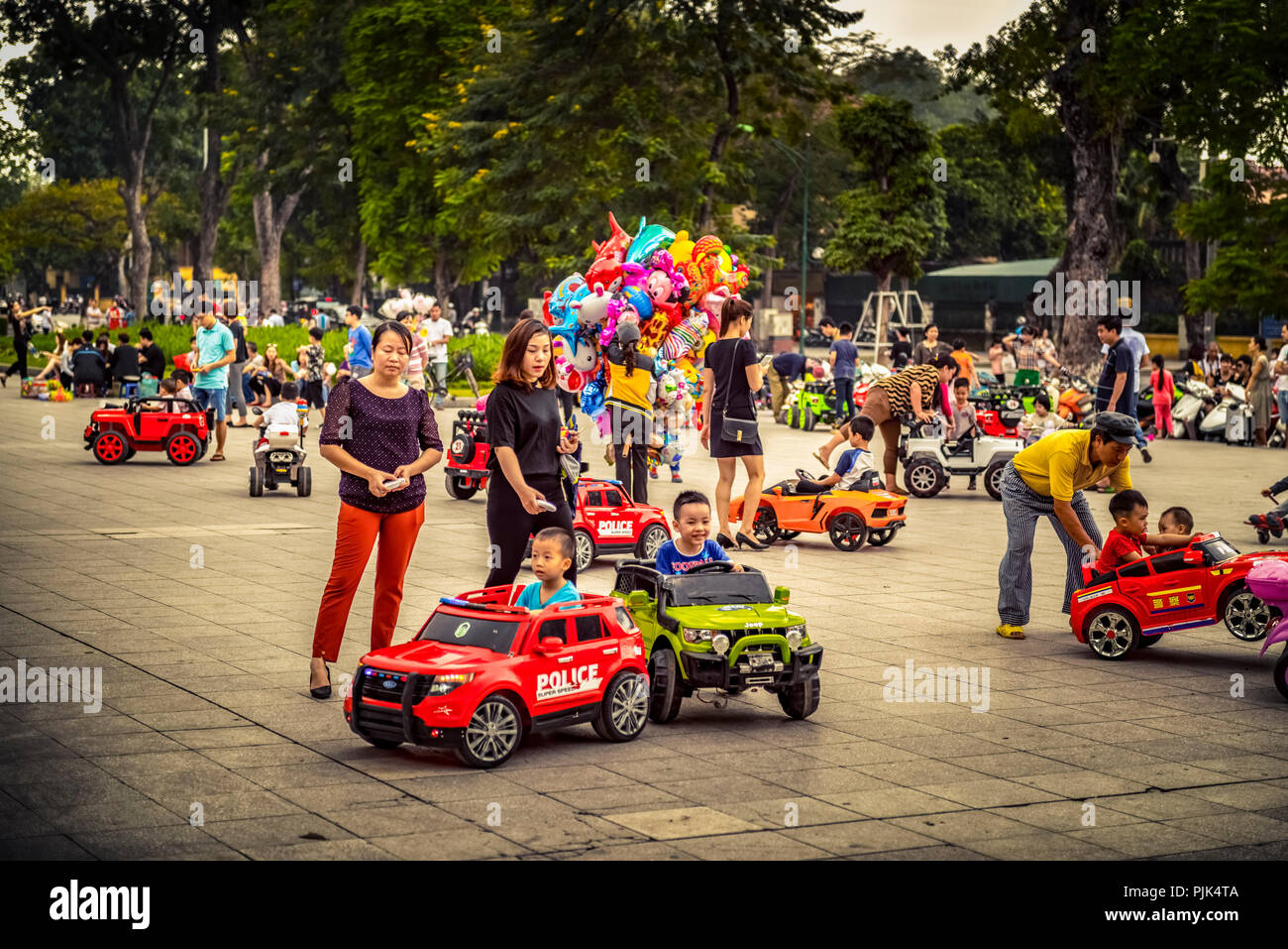 Asia, Vietnam, Hanoi, children, square, playground, cars Stock Photo