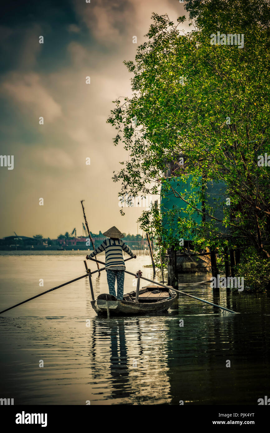 Asia, Southeast Asia, South Vietnam, Vietnam, Mekong Delta, floating market, man in the boat Stock Photo