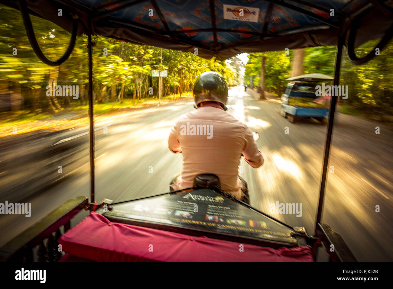 Asia, Cambodia, Angkor Wat, Tuk Tuk ride Stock Photo