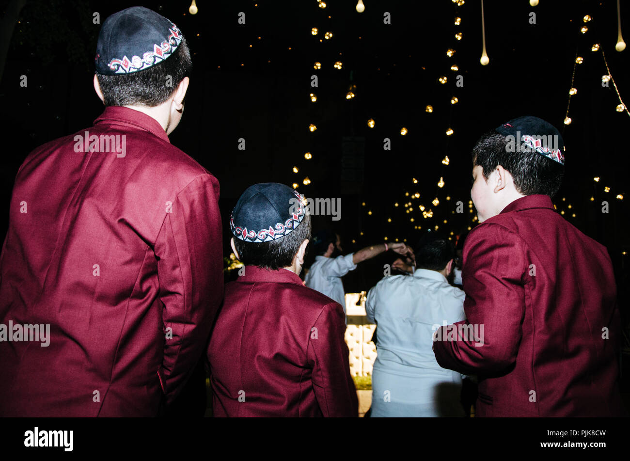 Back children wearing a Kippah at a wedding Stock Photo