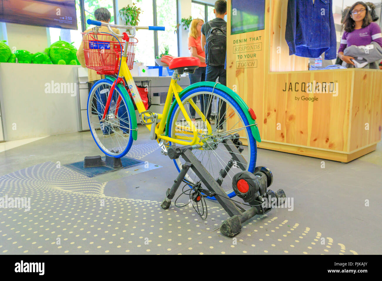 Mountain View, California, United States - August 13, 2018: colorful Google's Bike inside the Merchandise Store of Google in Silicon Valley. Gadget and branded souvenirs are sold in the shop. Stock Photo