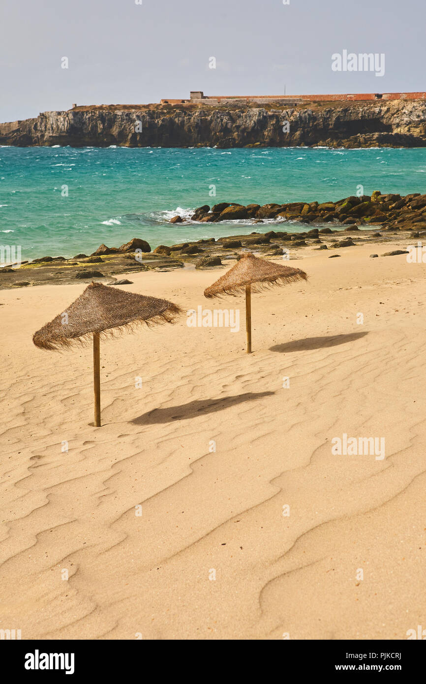 Straw Parasols On A Sunny Golden Beach In Tarifa Andalusia Spain Near Tangier In Morocco Stock Photo Alamy