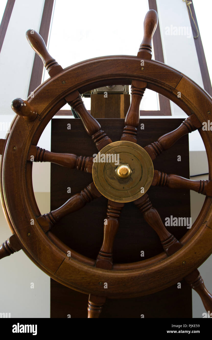 Front view of wooden rudder on a sailing ship inside the capitan's ...