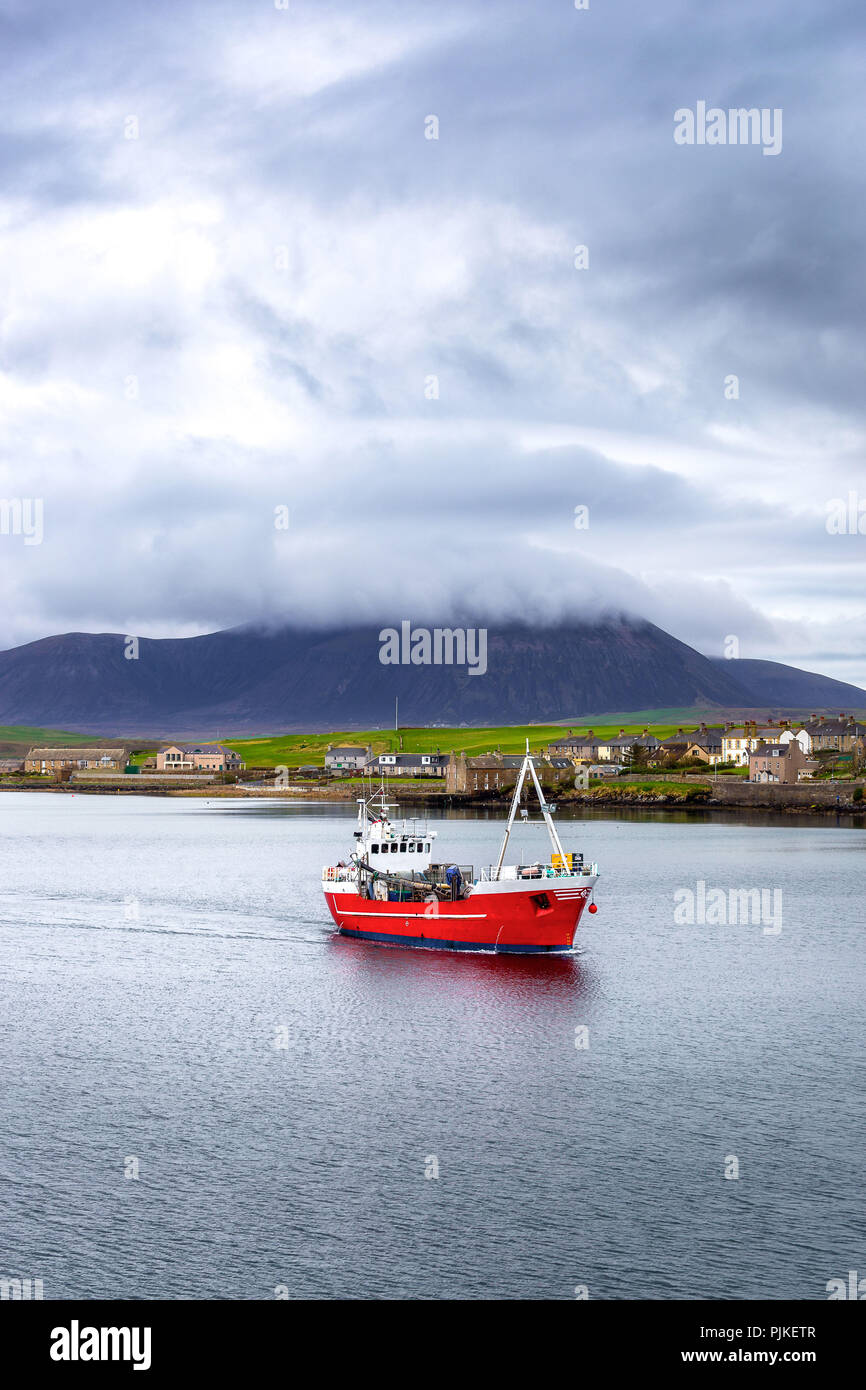 A ship in the harbor of Stromness, Orkney Islands Stock Photo