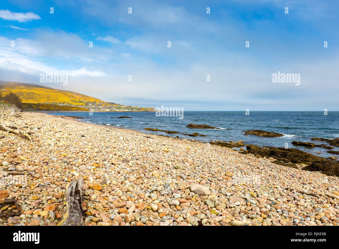 The view to Helmsdale from the rocky beach Stock Photo