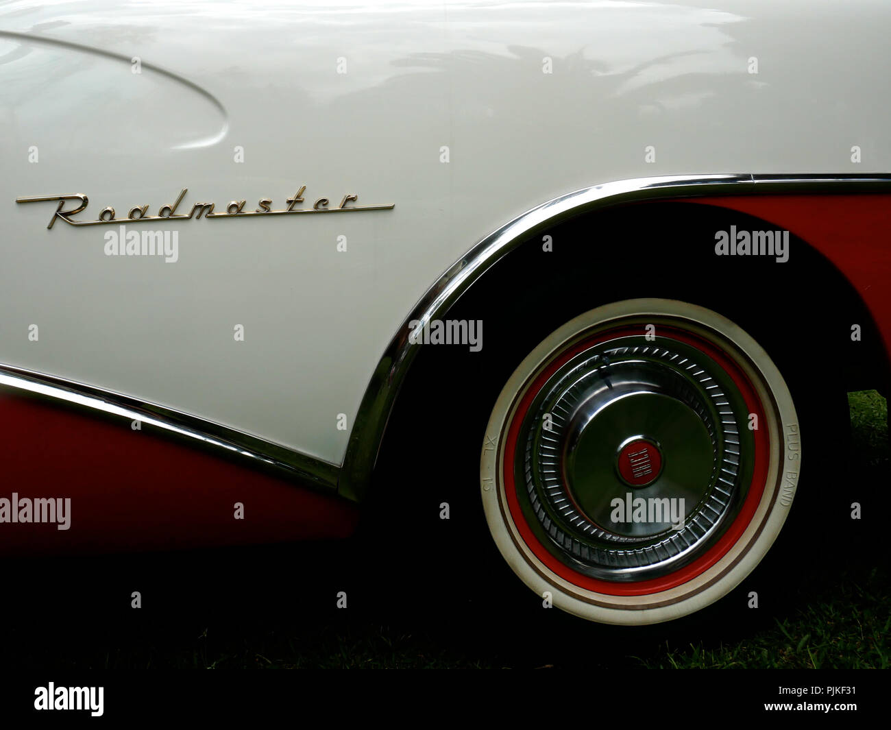 Details of american 50s cars during an exhibition in Medellín Colombia rear wheel white and red Buick Roadmaster Stock Photo